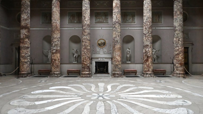 View of the Marble Hall floor at Kedleston with marble pillars in the background
